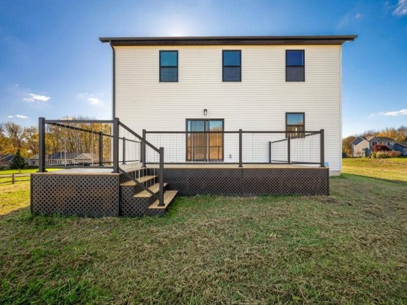 Elevated home with a lower enclosure showing flood vents and features reviewed for an updated elevation certificate in Fort Myers